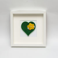 Obrazek – Zielone serce z kwiatem