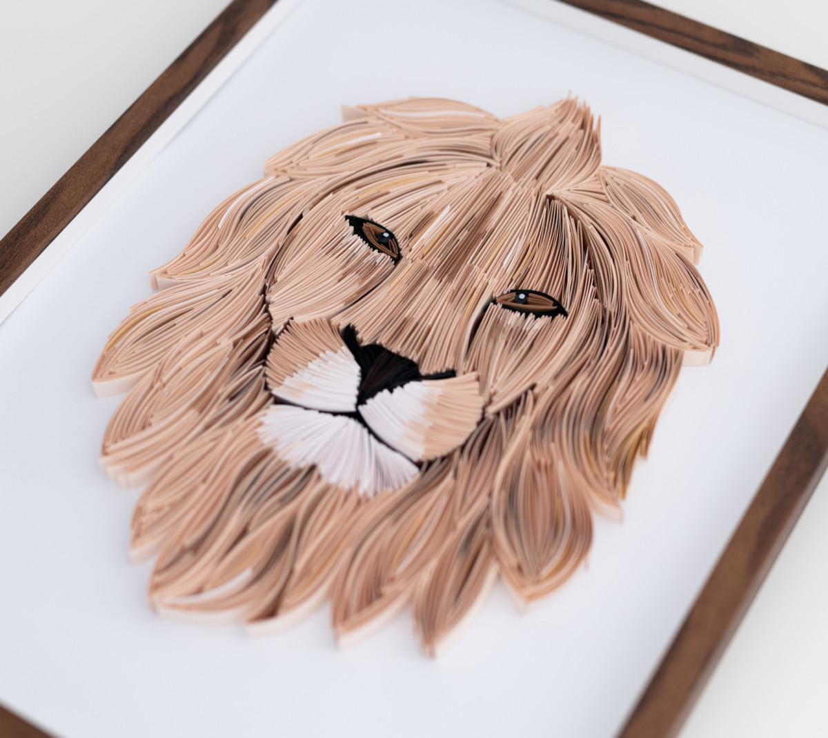 framed lion paper art